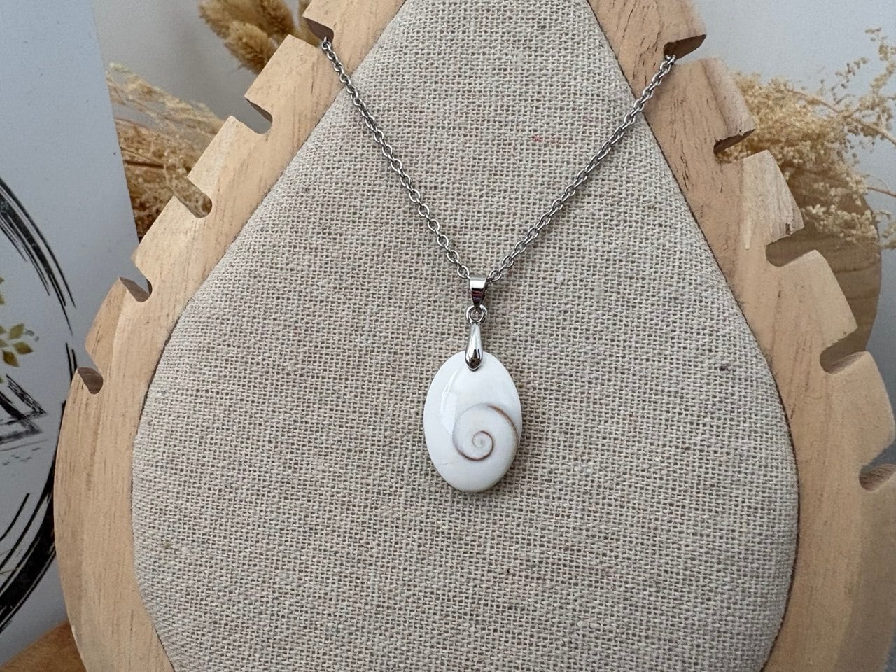 IMAGE 2026-07-10 13:28:42 Collier pendentif porte-bonheur ovale arrondi petit modèle, Oeil de Sainte Lucie, chaine acier inoxydable argenté – Image 1